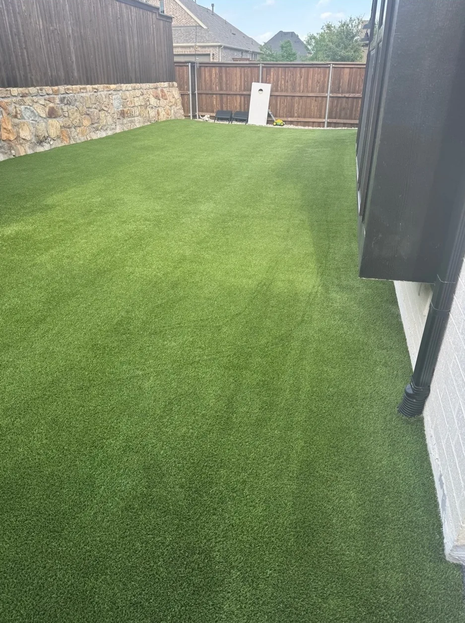 Large artificial turf lawn professionally cleaned and restored